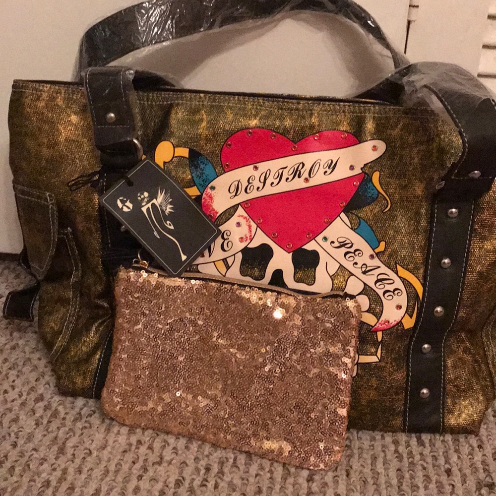 NWT. FOR ALL YOU “DEAD HEADS”. GREAT GOLD BAG